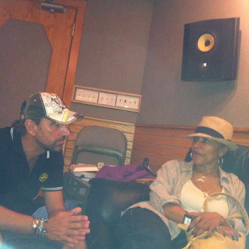 Norma Jean Wright and Gene Douglas talking in a recording studio